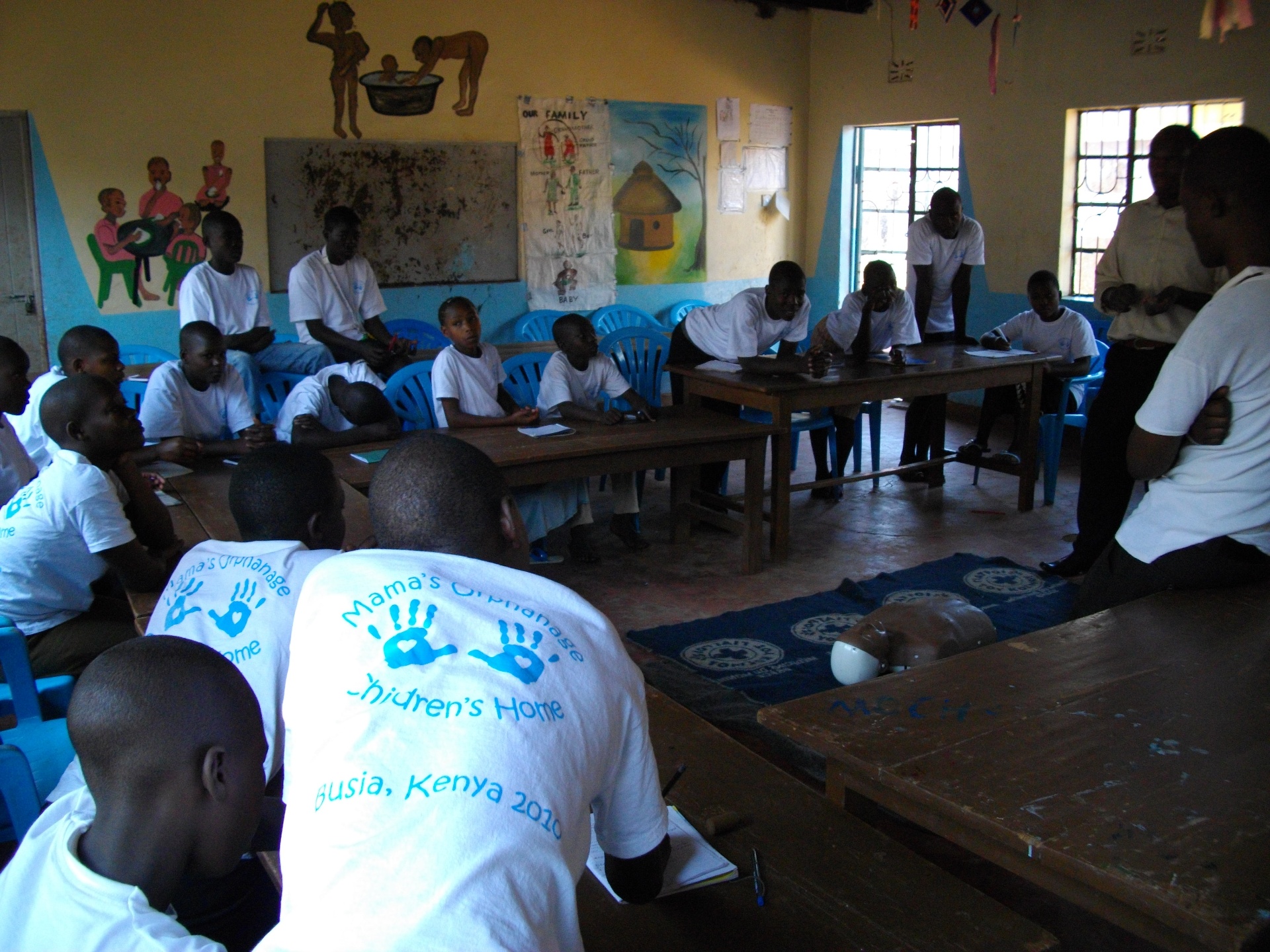 Children learning together in a classroom in Busia, Kenya